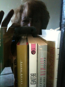 Self Portrait in Robert's Bookcase